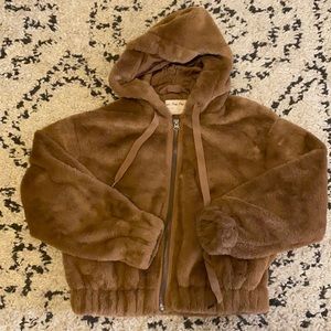 Light brown “we the free” faux fur zip up jacket.